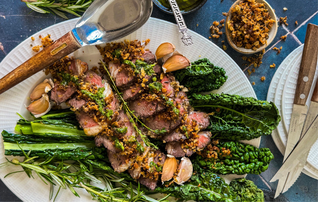 Crusted lamb with baby greens and saffron potatoes - food and drink trends 2025